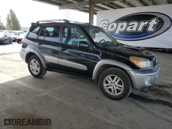2003 Toyota RAV4 with VIN JTEGH20V030098882, listed as a Copart auction lot 54357825 with 208,991 mi miles and Salvage Title. Bid and sale history available at DreamBid. Image 4.