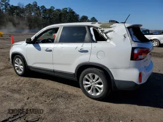 2015 Kia Sorento EX with VIN 5XYKU4A79FG652165, listed as a Copart auction lot 86914004 with 60,239 mi miles and Salvage Title. Bid and sale history available at carsss.com. Image 2.