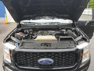 2021 Ford F-150 XL with VIN 1FTEW1EP2MFA19832, listed as a Copart auction lot 57981895 with 66,766 mi miles and Salvage title. Bid and sale history available at DreamBid. Image 11.