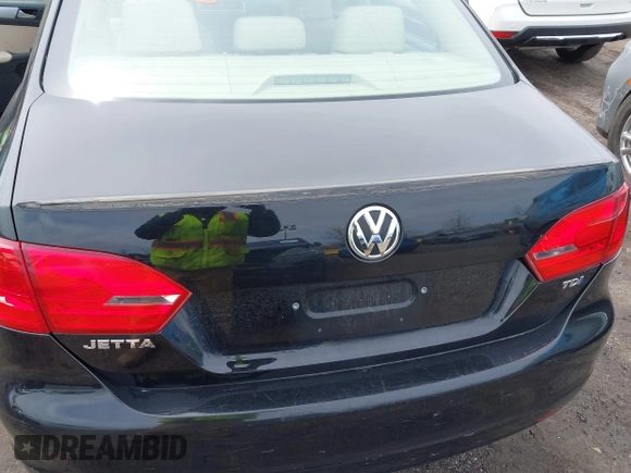 2012 Volkswagen Jetta Sedan TDI w/Premium & Nav with VIN 3VWLL7AJXCM026589, listed as a IAAI auction lot 41870945 with 72,544 mi miles. Bid and sale history available at carsss.com. Image 13.