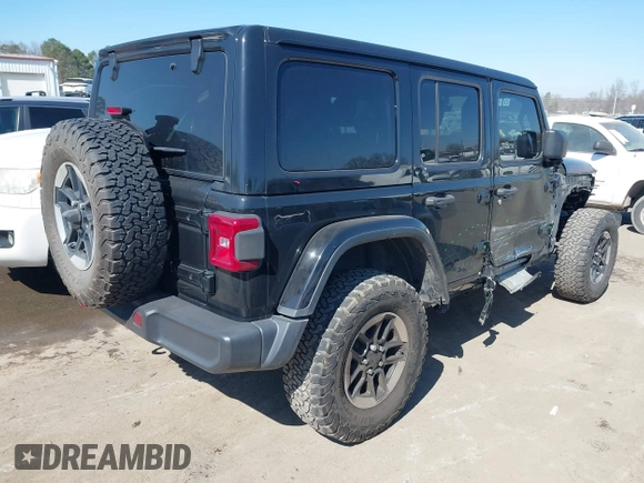 2019 Jeep Wrangler Unlimited Rubicon with VIN 1C4HJXFN1KW679028, listed as a IAAI auction lot 41654887 with 32,247 mi miles and . Bid and sale history available at DreamBid. Image 4.