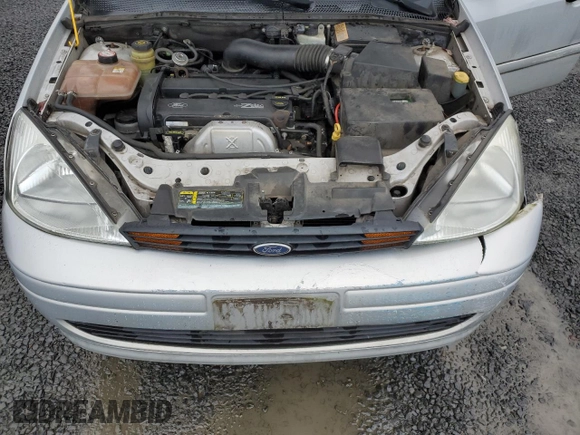 2002 Ford Focus SE Fleet с VIN 1FAFP36312W286116, выставлен на аукционе Copart как лот 82258134 с пробегом 83 668 миль миль и Списание • Salvage title. История ставок и продаж доступна на DreamBid. Изображение 13.