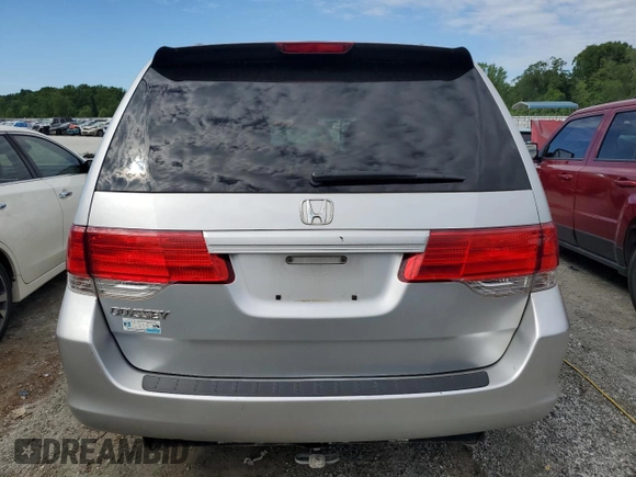 2010 Honda Odyssey LX with VIN 5FNRL3H25AB027316, listed as a Copart auction lot 57937805 with 181,551 mi miles and Salvage title. Bid and sale history available at DreamBid. Image 6.