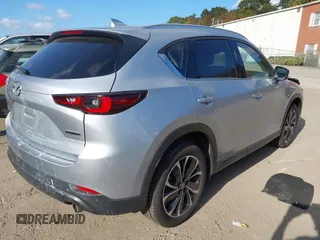 2023 Mazda CX-5 2.5 S Premium Package with VIN JM3KFBDM6P0158294, listed as a IAAI auction lot 40662093 with 15,841 mi miles. Bid and sale history available at carsss.com. Image 4.