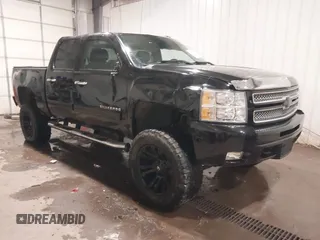 2013 Chevrolet Silverado 1500 LT with VIN 3GCPKSE75DG238194, listed as a IAAI auction lot 40997920 with 163,303 mi miles. Bid and sale history available at carsss.com. Image 1.