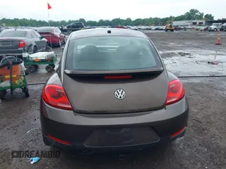 2012 Volkswagen Beetle 2.5L PZEV with VIN 3VWJP7AT2CM638265, listed as a IAAI auction lot 42512449 with 137,129 mi miles and . Bid and sale history available at DreamBid. Image 16.