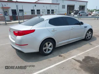 2015 Kia Optima LX z VIN 5XXGM4A7XFG452440, wystawiony jako IAAI lot #42415617 z przebiegiem 68 474 mil mil oraz . Historia ofert i sprzedaży dostępna na DreamBid. Obrazek 4.