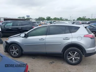 2018 Toyota RAV4 XLE with VIN JTMWFREV7JJ203609, listed as a IAAI auction lot 41938100 with 51,021 mi miles. Bid and sale history available at carsss.com. Image 14.