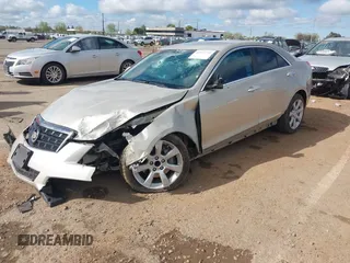 2014 Cadillac ATS Standard RWD with VIN 1G6AA5RX3E0129469, listed as a IAAI auction lot 41934275 with 95,653 mi miles. Bid and sale history available at carsss.com. Image 2.