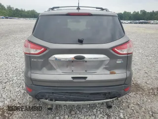 2013 Ford Escape SEL z VIN 1FMCU9HX7DUC11052, wystawiony jako Copart lot #62377515 z przebiegiem 225 704 mil mil oraz Szkoda całkowita • Salvage title. Historia ofert i sprzedaży dostępna na DreamBid. Obrazek 6.