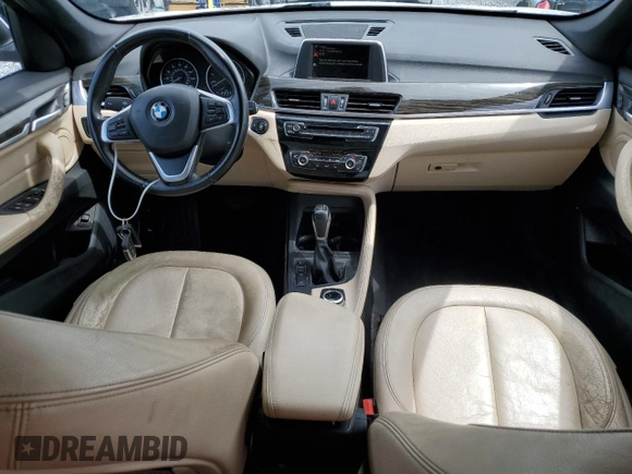 2017 BMW X1 xDrive28i with VIN WBXHT3Z37H4A55614, listed as a Copart auction lot 63491415 with 120,680 mi miles and Salvage title. Bid and sale history available at DreamBid. Image 8.