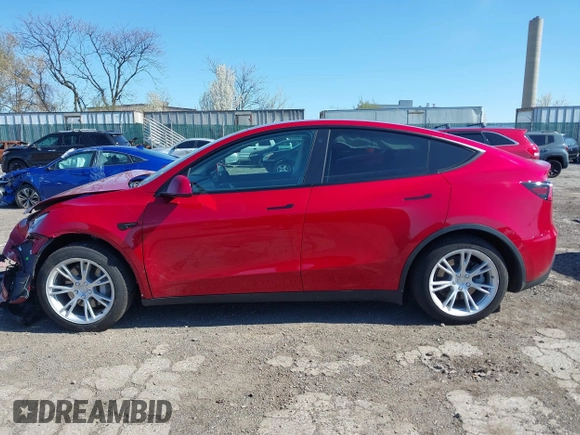 2021 Tesla Model Y Standard Range with VIN 5YJYGDED1MF111410, listed as a IAAI auction lot 41942323 with 24,836 mi miles. Bid and sale history available at carsss.com. Image 13.
