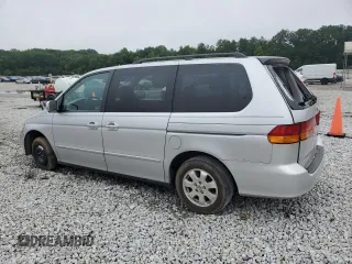2004 Honda Odyssey EX-L with VIN 5FNRL18044B069774, listed as a Copart auction lot 57096535 with 165,307 mi miles and Salvage title. Bid and sale history available at DreamBid. Image 2.
