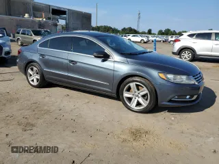 2013 Volkswagen CC R-Line with VIN WVWBP7AN0DE508775, listed as a Copart auction lot 74292864 with 76,086 mi miles and Salvage Title. Bid and sale history available at carsss.com. Image 4.