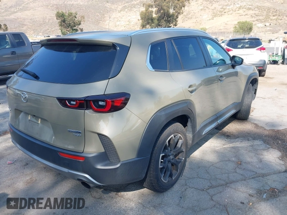 2023 Mazda CX-50 2.5 Turbo with VIN 7MMVABXY5PN120917, listed as a IAAI auction lot 42431995 with 34,421 mi miles and . Bid and sale history available at DreamBid. Image 4.