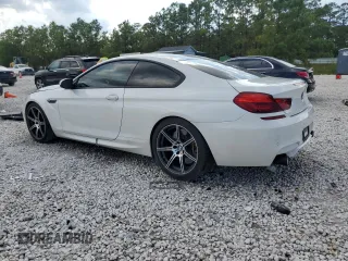 2014 BMW M6 z VIN WBSLX9C51ED160143, wystawiony jako Copart lot #73044214 z przebiegiem 91 717 mil mil oraz Szkoda całkowita • Salvage title. Historia ofert i sprzedaży dostępna na DreamBid. Obrazek 2.