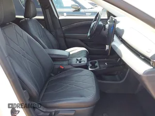 2021 Ford Mustang Mach-E Select z VIN 3FMTK1RM1MMA49774, wystawiony jako IAAI lot #42462914 z przebiegiem 16 754 mil mil oraz . Historia ofert i sprzedaży dostępna na DreamBid. Obrazek 5.