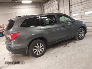 2019 Honda Pilot EX-L with VIN 5FNYF6H50KB035548, listed as a IAAI auction lot 42011724 with 105,195 mi miles and . Bid and sale history available at DreamBid. Image 4.