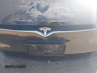 2016 Tesla Model S 90D with VIN 5YJSA1E21GF140740, listed as a IAAI auction lot 42062461 with 237,943 mi miles and . Bid and sale history available at DreamBid. Image 6.