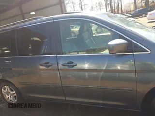 2005 Honda Odyssey EX-L with VIN 5FNRL387X5B069823, listed as a IAAI auction lot 41883007 with 267,250 mi miles and . Bid and sale history available at DreamBid. Image 13.