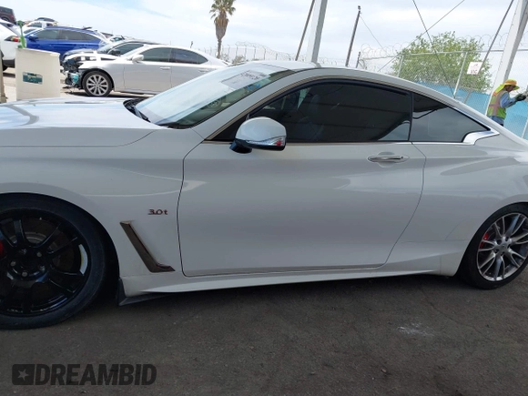 2017 Infiniti Q60 Premium with VIN JN1EV7EK8HM360988, listed as a IAAI auction lot 42009120 with 112,384 mi miles and . Bid and sale history available at DreamBid. Image 13.