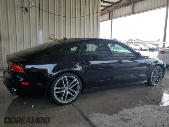 2015 Audi A7 3.0 Prestige with VIN WAU2GAFCXFN011804, listed as a Copart auction lot 67521504 with 129,734 mi miles and Salvage Title. Bid and sale history available at carsss.com. Image 3.