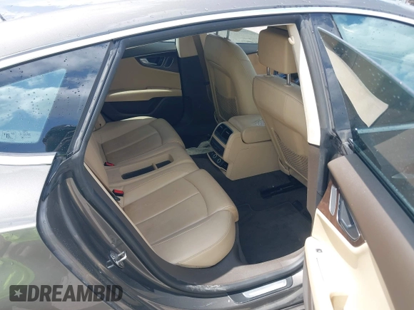 2012 Audi A7 Premium Plus with VIN WAUYGAFC1CN085666, listed as a IAAI auction lot 42177867 with 242,775 mi miles and . Bid and sale history available at DreamBid. Image 8.