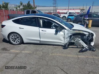 2022 Tesla Model 3 Long Range with VIN 5YJ3E1EB7NF298456, listed as a IAAI auction lot 41859304 with Not Provided miles and . Bid and sale history available at DreamBid. Image 13.