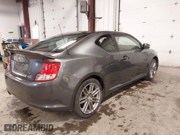 2011 Scion tC z VIN JTKJF5C75B3011546, wystawiony jako IAAI lot #42314036 z przebiegiem 266 448 mil mil oraz . Historia ofert i sprzedaży dostępna na DreamBid. Obrazek 4.