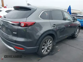 2018 Mazda CX-9 Grand Touring with VIN JM3TCBDY1J0200183, listed as a IAAI auction lot 42408132 with 69,023 mi miles and . Bid and sale history available at DreamBid. Image 4.