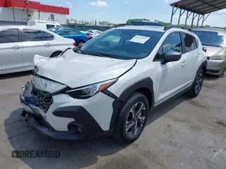 2024 Subaru Crosstrek Premium with VIN JF2GUADC2R8913808, listed as a IAAI auction lot 42171997 with 1,219 mi miles and . Bid and sale history available at DreamBid. Image 17.