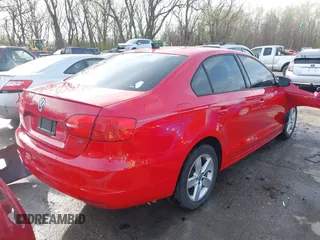 2012 Volkswagen Jetta Sedan TDI w/Premium & Nav with VIN 3VWLL7AJ3CM384729, listed as a IAAI auction lot 41899395 with 130,220 mi miles. Bid and sale history available at carsss.com. Image 4.