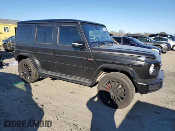 2023 Mercedes-Benz G 550 with VIN W1NYC6BJ8PX477062, listed as a Copart auction lot 46707575 with 20,232 mi miles and Salvage Title. Bid and sale history available at DreamBid. Image 4.
