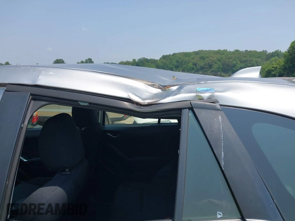 2014 Mazda CX-5 Sport with VIN JM3KE4BE9E0411177, listed as a IAAI auction lot 42411938 with 167,709 mi miles and . Bid and sale history available at DreamBid. Image 6.