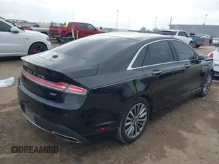 2018 Lincoln MKZ Select z VIN 3LN6L5C93JR620170, wystawiony jako IAAI lot #41488730 z przebiegiem 101 040 mil mil oraz . Historia ofert i sprzedaży dostępna na DreamBid. Obrazek 4.