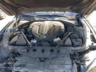 2012 BMW 7 Series 750Li xDrive with VIN WBAKC8C53CC435553, listed as a IAAI auction lot 41852097 with 127,418 mi miles and . Bid and sale history available at DreamBid. Image 10.