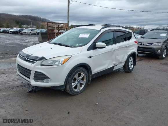 2013 Ford Escape SE with VIN 1FMCU9G92DUB07099, listed as a IAAI auction lot 41730458 with 136,633 mi miles. Bid and sale history available at carsss.com. Image 17.