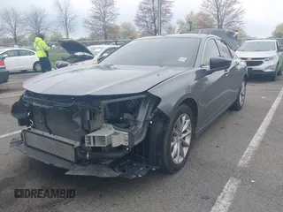 2023 Acura TLX z VIN 19UUB5F30PA006879, wystawiony jako IAAI lot #42006899 z przebiegiem 35 379 mil mil oraz . Historia ofert i sprzedaży dostępna na DreamBid. Obrazek 2.