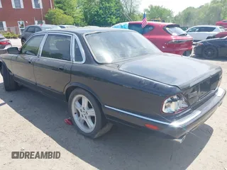 1999 Jaguar XJ with VIN SAJPX1841XC864072, listed as a IAAI auction lot 42176220 with 122,712 mi miles and . Bid and sale history available at DreamBid. Image 3.