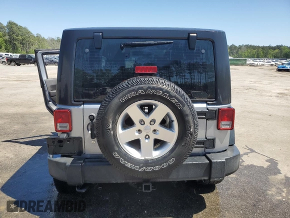 2013 Jeep Wrangler Sport z VIN 1C4AJWAG2DL649500, wystawiony jako Copart lot #52859775 z przebiegiem 70 254 mil mil oraz Szkoda całkowita • Salvage title. Historia ofert i sprzedaży dostępna na DreamBid. Obrazek 6.