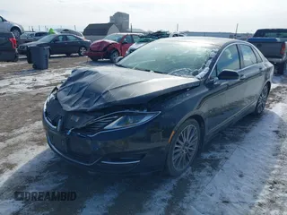 2014 Lincoln MKZ z VIN 3LN6L2GKXER809691, wystawiony jako IAAI lot #41588488 z przebiegiem 163 552 mil mil oraz . Historia ofert i sprzedaży dostępna na DreamBid. Obrazek 6.