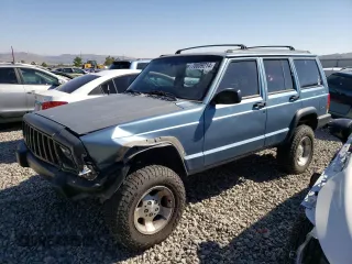 1997 Jeep Cherokee SE with VIN 1J4FJ28S4VL544977, listed as a Copart auction lot 70059214 with 271,174 mi miles and Salvage Title. Bid and sale history available at carsss.com. Image 1.