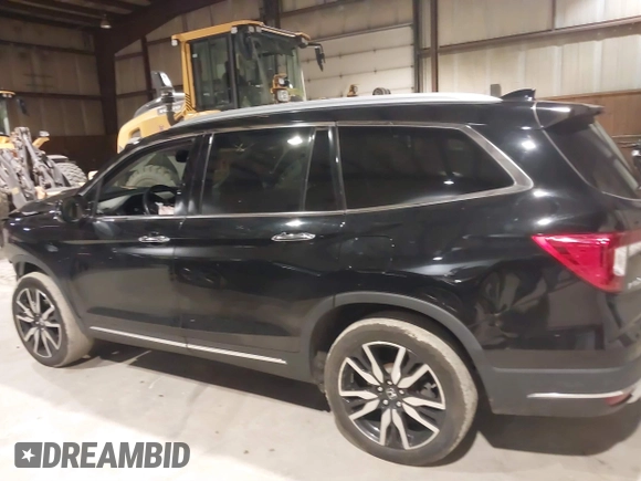2020 Honda Pilot Touring 7-Passenger with VIN 5FNYF6H63LB032301, listed as a IAAI auction lot 38419333 with 50,433 mi miles and . Bid and sale history available at carsss.com. Image 15.