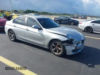 2015 BMW 3 Series 320i with VIN WBA3B1G53FNT05936, listed as a IAAI auction lot 42591667 with 143,594 mi miles and . Bid and sale history available at DreamBid. Image 1.