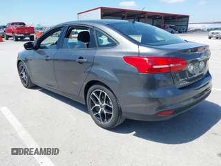 2018 Ford Focus SE z VIN 1FADP3FE6JL223294, wystawiony jako IAAI lot #42067973 z przebiegiem 74 734 mil mil oraz . Historia ofert i sprzedaży dostępna na DreamBid. Obrazek 3.