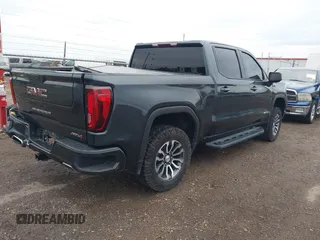 2021 GMC Sierra 1500 AT4 with VIN 1GTP9EED8MZ391803, listed as a IAAI auction lot 41275238 with 84,024 mi miles. Bid and sale history available at carsss.com. Image 4.