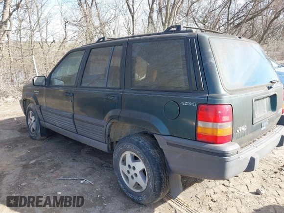 1993 Jeep Grand Cherokee Laredo with VIN 1J4GZ58S1PC680016, listed as a IAAI auction lot 41813392 with 149,520 mi miles. Bid and sale history available at carsss.com. Image 3.