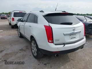 2013 Cadillac SRX Premium Collection with VIN 3GYFNEE36DS508381, listed as a IAAI auction lot 42164119 with 85,810 mi miles and . Bid and sale history available at DreamBid. Image 3.