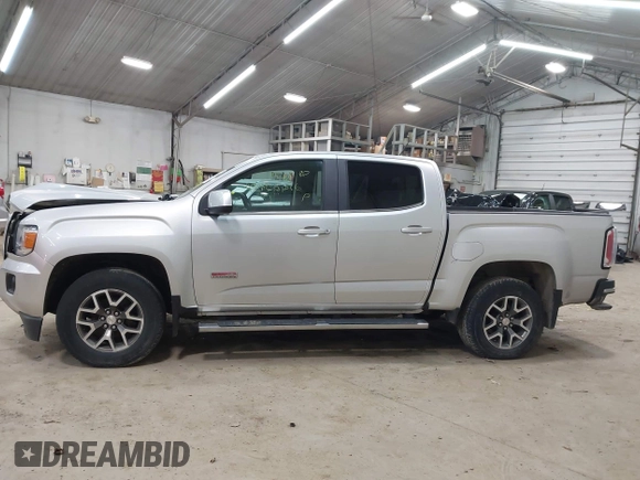 2015 GMC Canyon 4WD SLE z VIN 1GTG6BE39F1252926, wystawiony jako IAAI lot #42128396 z przebiegiem 113 139 mil mil oraz . Historia ofert i sprzedaży dostępna na DreamBid. Obrazek 14.