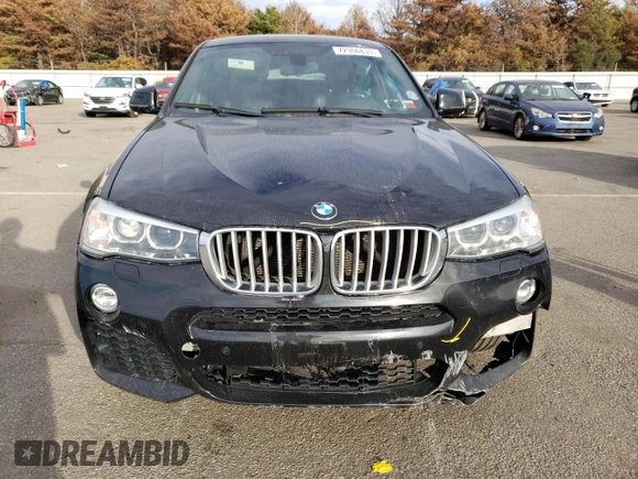 2016 BMW X4 xDrive28i with VIN 5UXXW3C55G0R22729, listed as a Copart auction lot 72906833 with 98,668 mi miles. Bid and sale history available at carsss.com. Image 5.